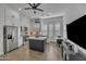 Bright eat-in kitchen featuring a large island, stainless steel appliances, and lots of storage at 2652 E Pelican Ct, Gilbert, AZ 85297