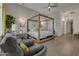 Beautifully furnished main bedroom with sitting area and natural wood floors at 2652 E Pelican Ct, Gilbert, AZ 85297