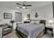 Inviting main bedroom featuring a cozy seating area, neutral decor, and ample natural light at 2652 E Pelican Ct, Gilbert, AZ 85297