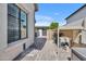 Well-maintained side yard with stone pathway, equipment, and block wall at 2652 E Pelican Ct, Gilbert, AZ 85297