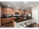 Well-equipped kitchen with granite counters, stainless steel appliances, and a center island at 27189 N 75Th Dr, Peoria, AZ 85383