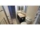 Bathroom featuring a single sink vanity and toilet with tile floors at 2831 E Waltann Ln # 1, Phoenix, AZ 85032