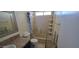 Bathroom featuring a single sink vanity and shower-tub combination at 2831 E Waltann Ln # 1, Phoenix, AZ 85032