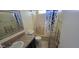 Bathroom featuring a single sink vanity and shower-tub combination at 2831 E Waltann Ln # 1, Phoenix, AZ 85032