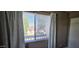 A bright bedroom view shows natural light streaming through the window at 2831 E Waltann Ln # 1, Phoenix, AZ 85032