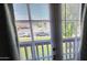 Bedroom window with white blinds looking out to neighborhood street at 2831 E Waltann Ln # 1, Phoenix, AZ 85032
