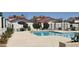 Inviting community pool with lounge chairs and well-manicured landscaping at 2831 E Waltann Ln # 1, Phoenix, AZ 85032