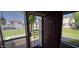 View of front door with security gate leading into home with windows on each side at 2831 E Waltann Ln # 1, Phoenix, AZ 85032