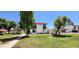 Well-manicured lawns and mature landscaping create a peaceful exterior at 2831 E Waltann Ln # 1, Phoenix, AZ 85032