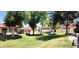 Green lawns create a park-like setting within community at 2831 E Waltann Ln # 1, Phoenix, AZ 85032