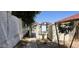 Pool area entrance, featuring decorative fencing and posted pool regulations at 2831 E Waltann Ln # 1, Phoenix, AZ 85032