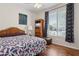 Comfortable bedroom with ceiling fan, hardwood floors, and natural light at 29839 N Little Leaf Dr, San Tan Valley, AZ 85143