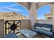 Relaxing balcony with seating area, offering views of the nearby desert landscape at 3236 E Chandler Blvd # 2018, Phoenix, AZ 85048