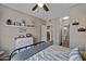 Bedroom showcasing a modern dresser with decor, a closet, and an ensuite bathroom at 3236 E Chandler Blvd # 2018, Phoenix, AZ 85048