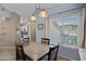 Cozy dining area with a window and access to kitchen appliances at 3236 E Chandler Blvd # 2018, Phoenix, AZ 85048