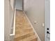 Staircase with neutral walls, tile steps, and white banister at 3236 E Chandler Blvd # 2018, Phoenix, AZ 85048