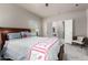 Bedroom featuring neutral-colored walls, carpeted floors, a ceiling fan, and an adjoining room at 3301 S Goldfield Rd # 1048, Apache Junction, AZ 85119