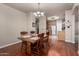 Comfortable dining area with hardwood flooring and natural light from a skylight at 3301 S Goldfield Rd # 1048, Apache Junction, AZ 85119