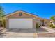 Well maintained home with mature desert landscaping and an attached two car garage at 3301 S Goldfield Rd # 1048, Apache Junction, AZ 85119