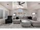 Bright living room with plush carpeting, vaulted ceilings and ample natural light at 3301 S Goldfield Rd # 1048, Apache Junction, AZ 85119