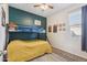 Comfortable bedroom with a bunk bed, neutral walls, and a geometric rug, perfect for  at 36033 W Catalonia Dr, Maricopa, AZ 85138