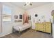 Bright bedroom with a single bed, playful accessories, and a sunny window, ideal for a  at 36033 W Catalonia Dr, Maricopa, AZ 85138