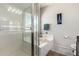 Bright bathroom featuring a soaking tub with a glass-enclosed shower and stylish decor at 3719 E Sandy Way, Gilbert, AZ 85297