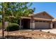 Charming home featuring neutral paint, desert landscaping, and a two-car garage at 3719 E Sandy Way, Gilbert, AZ 85297