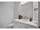 Half bathroom featuring mosaic tile and updated vanity at 3800 E Lincoln Dr # 31, Phoenix, AZ 85018