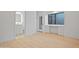 Bedroom with office, bathroom access and hardwood flooring at 3800 E Lincoln Dr # 31, Phoenix, AZ 85018