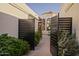 Welcoming courtyard entry featuring a wrought iron gate at 3800 E Lincoln Dr # 31, Phoenix, AZ 85018