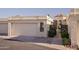 Exterior shot showcasing the attached garage and the beautiful architectural details of the home at 3800 E Lincoln Dr # 31, Phoenix, AZ 85018