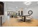 Bright, open living room with light floors, stone fireplace, recessed lighting, and outdoor views at 3800 E Lincoln Dr # 31, Phoenix, AZ 85018