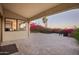 Inviting covered patio with bougainvillea views and tile flooring at 3800 E Lincoln Dr # 31, Phoenix, AZ 85018