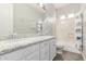 A bathroom featuring a double vanity with granite countertops and a shower-tub combination at 3884 S Wilson Dr, Chandler, AZ 85286