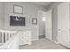 This Bedroom features a dresser, wall decor, and two doors, creating a functional space at 3884 S Wilson Dr, Chandler, AZ 85286