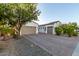 Spacious driveway to a beautiful home with a two car garage on each side of the house at 3884 S Wilson Dr, Chandler, AZ 85286