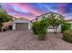 Charming home featuring a well-maintained front yard and a two-car garage with a spacious driveway at 3884 S Wilson Dr, Chandler, AZ 85286