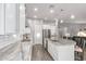 Gourmet kitchen showcases granite countertops, stainless steel appliances, and a large central island at 3884 S Wilson Dr, Chandler, AZ 85286