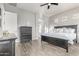 Comfortable main bedroom with wood floors and a view of the ensuite bathroom at 3884 S Wilson Dr, Chandler, AZ 85286