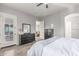 Bright main bedroom features wood floors, a ceiling fan, and a closet at 3884 S Wilson Dr, Chandler, AZ 85286