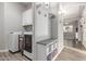 Bright mudroom with storage and convenient laundry area featuring a washer and dryer at 3884 S Wilson Dr, Chandler, AZ 85286