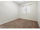 Cozy bedroom with soft carpet and natural light at 4212 E Jasper Dr, Gilbert, AZ 85296