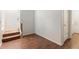 Inviting entryway with wood floors and staircase access to upper level at 4212 E Jasper Dr, Gilbert, AZ 85296