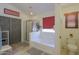 Bright bathroom features a tub, a glass enclosed shower stall, and a window at 45138 W Norris Rd, Maricopa, AZ 85139