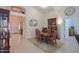 Elegant dining area adjacent to the entry way with nice natural light at 45138 W Norris Rd, Maricopa, AZ 85139