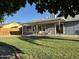 Spacious backyard with covered patio and privacy fence at 4608 W Gail Dr, Chandler, AZ 85226
