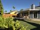 Spacious backyard with covered patio and privacy fence at 4608 W Gail Dr, Chandler, AZ 85226