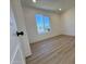 This bright bedroom features wood-look floors and large window at 4608 W Gail Dr, Chandler, AZ 85226