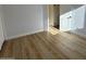 Bedroom with wood-look floors and bright light at 4608 W Gail Dr, Chandler, AZ 85226